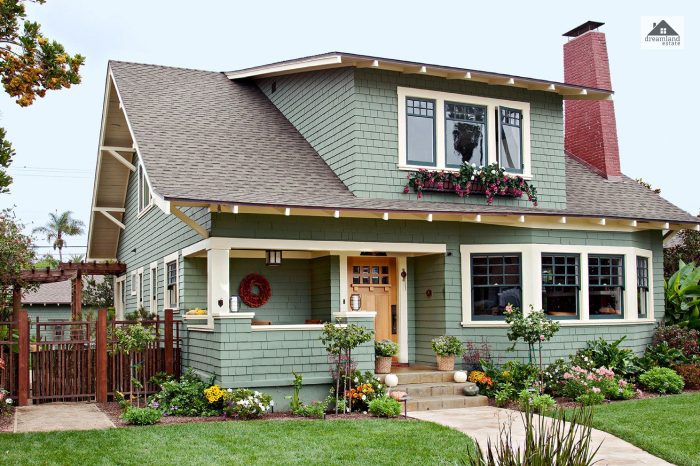 Craftsman Styled Ranch House With Grayish Green Trim and Teal Wall