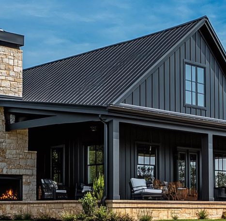 black barndominium with wood accents